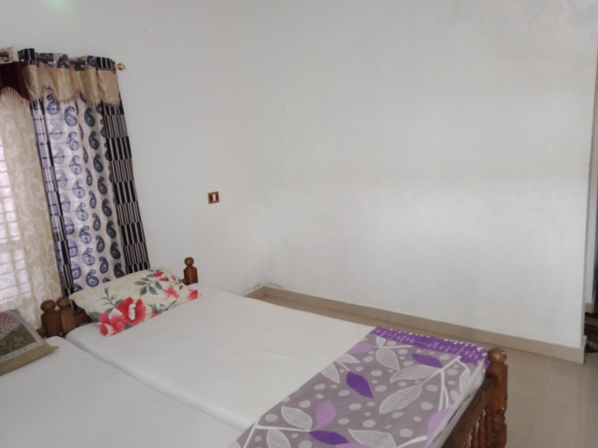Hôtel Mango Palace à Varkala Extérieur photo